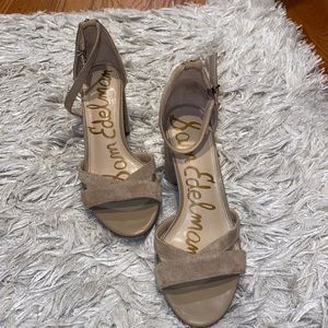 Lightly worn beige high heels